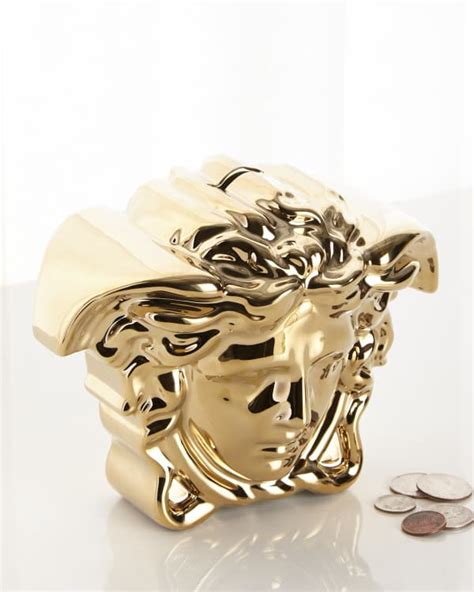 versace medusa piggy bank|Versace break the bank gold.